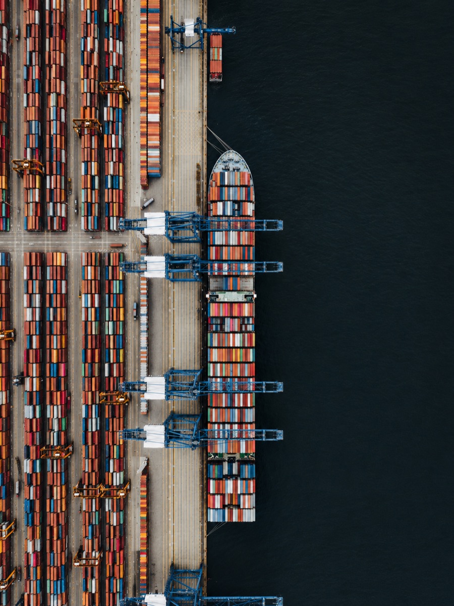 Aerial view of a container terminal with a vessel alongside